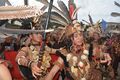 Dayak warrior parade in an event commemorating Youth Pledge Day at the Anjungan, West Kalimantan.