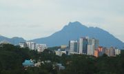 Kuching CBD skyline with Mount Santubong in the background