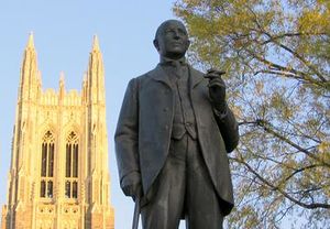 Statue of James B. Duke in foreground with Duke Chapel behind