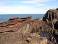 Hutton's angular unconformity at Siccar Point where 345 million year old Devonian Old Red Sandstone overlies 425 million year old Silurian greywacke.[3]