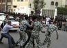 ضباط الجيش يعتقلون أحد المتظاهرين أمام السفارة السعودية بالقاهرة 28 أبريل 2012