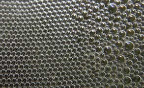 Hexagonal order of bubbles in a foam.