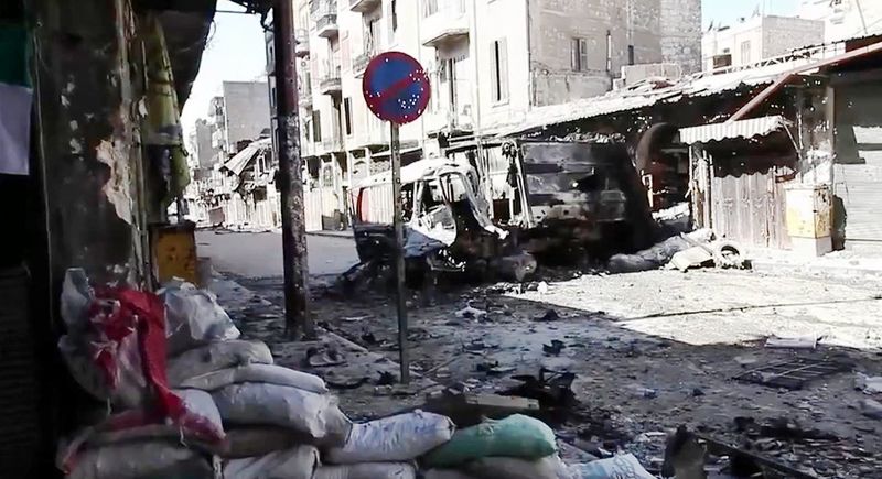 ملف:Bombed out vehicles Aleppo.jpg