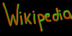 The word "Wikipedia" written in green and red on black background