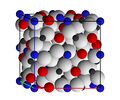 Crystal structure of pyrope garnet. White spheres are oxygen; black, silicon; blue, aluminium; and red, magnesium.