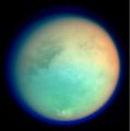Titan in false color showing surface details and atmosphere. "Xanadu" is the bright region at the centre-right.