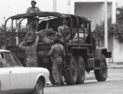 Rebels in a truck after being detained by royalist forces.png