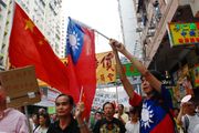 Protesters waving PRC and ROC flags during an anti-Japan demonstrations in Hong Kong in 2012.