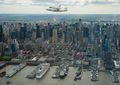 Enterprise over New York. The Intrepid Sea, Air & Space Museum, Enterprise's present home, can be seen below
