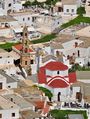 The Byzantine Panagia church with the belltower is located في مركز القرية