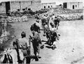 Members of the Yiftach Brigade entering al-Malikiyya, May 1948