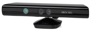 A long, black plastic tube with a stand on its bottom and sensors arrayed along its front. The Xbox 360 brand is displayed next to the sensors.