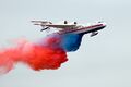 Beriev Be-200 dropping the water painted into the colors of the flag of Russia.