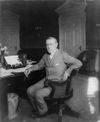 Woodrow Wilson at his desk in the Oval Office c.1913 cropped.jpg