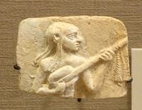 Musician playing a lute, Isin-Larsa period, 2000-1600 BC, baked clay - Oriental Institute Museum, University of Chicago