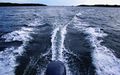 Wake from a small motorboat with an outboard motor.
