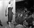Marilyn Monroe, motion picture actress, appearing with the USO, poses for pictures after a performance at the 3rd U.S. Inf. Div. area. February 17, 1954. Cpl. Welshman. (Army)