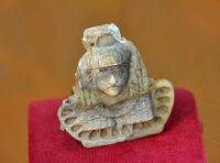 Carved ivory piece of an Egyptian woman.
