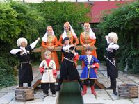 A group of Adyghe children in traditional clothes