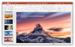 A photo presentation being created and edited in PowerPoint, running on Windows 10