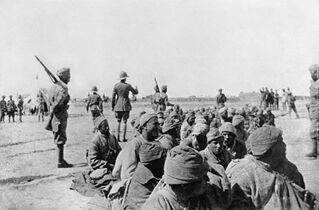 Indian troops guarding Turkish prisoners captured at Sannaiyat, 24 February 1917.