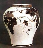 Joseon white porcelain jar with underglaze iron grape design.jpg