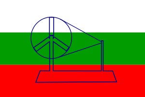 A tricolour flag of white, green and red with a spinning wheel in the centre
