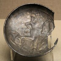 A probable Kushano-Sasanian plate with hunting scene, found in the 504 CE tomb of Feng Hetu in China. Shanxi Museum. It is dated the 3rd-4th century CE, and was probably manufactured in northern Afghanistan.[19][20][21]