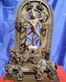 In the Shiva temple of Melakadambur is a rare Pala image that shows the ten-armed Nataraja dancing on his bull, Nandi