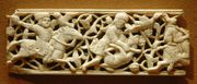 Carved and engraved ivory panel with hunters, Louvre