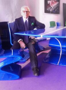 Pierre Cardin with the sculptures Cobra Table and Chair, 2012