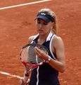 Elena Vesnina was part of the winning Women's Doubles team in 2013. It was her first Major Women's Doubles title and her first at Roland Garros.
