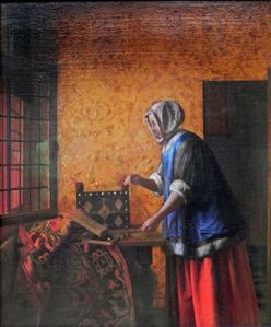 Interior with a Woman weighing Gold Coin, c.1659-1662