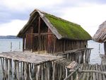 Reconstruction of a pile house at the Pfahlbau Museum Unteruhldingen on Lake Constance in Germany