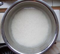 Soaking rice in a pot