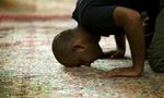 A man prays during Ramadan Jummah prayer at the Islamic Center in Washington, D.C. on August 13, 2010. (JIM WATSON/AFP/Getty Images)