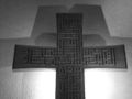 A wooden cross with Arabic calligraphy in Square Kufi style. The cross is currently in the National Evangelical Church of Beirut, a Protestant church in Lebanon. The work was made in 1995 by the Lebanese Arab Christian artist Istfén. The writings are John 3:16; they say in Arabic "لأنه هكذا أحب الله العالم حتى بذل ابنه الوحيد لكي لا يهلك كل من يؤمن به بل تكون له الحياة الأبدية". Dimensions of the cross are 140 cm X 100 cm.