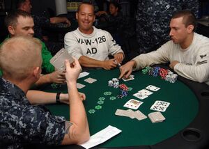 US Navy 090620-N-2798F-033 Sailors assigned to the aircraft carrier USS Harry S. Truman (CVN 75) and Carrier Air Wing (CVW) 3 compete in a Texas Hold 'Em Poker tournament aboard Harry S. Truman.jpg