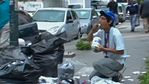Venezuelan eating from garbage.jpg