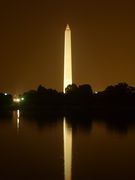 Washington Monument at night from the Jefferson Memorial, reflecting in the Tidal Basin.
