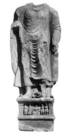 Buddha from Loriyan Tangai with inscription mentionning the "year 318", thought to be 143 CE.[29]