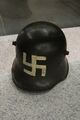German World War I helmet with swastika used by a member of the Marinebrigade Ehrhardt, a right-wing paramilitary free corps, participating in the Kapp Putsch 1920