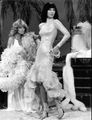 Farrah Fawcett and Cher in 1976. From the 1960s up to the 1980s, women aimed to look skinny. Tanned skin also became popular.[111]