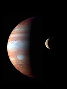 A composite image of Jupiter and Io, taken on February 28 and March 1, 2007 respectively. Jupiter is shown in infrared, whereas Io is shown in true-color.