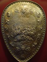 Shield of Henry II of France, steel damascened in silver and gold, design attributed to Etienne Delaune