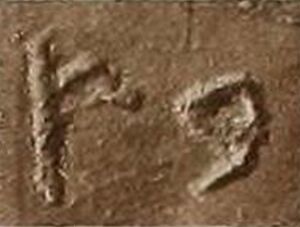 Closeup of two letters in the Phoenician abjad, carved in stone