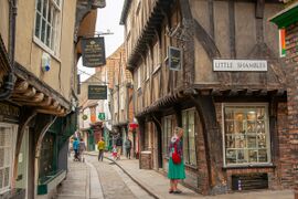 The Shambles is a medieval shopping street; most of the buildings date from between ح. 1350 and 1475.