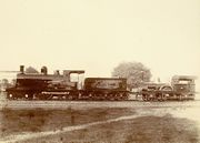 The first locomotive, shown on the right and christened "multum in parvo" (barely visible on the wheel casing), which was used by the East Indian Railway Company in 1854 on its 23-mile line from Howrah to Pandua.
