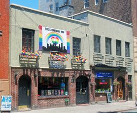 Stonewall Inn 2012 with gay-pride flags and banner.jpg