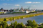 Kremlin with towers and minarets above a river